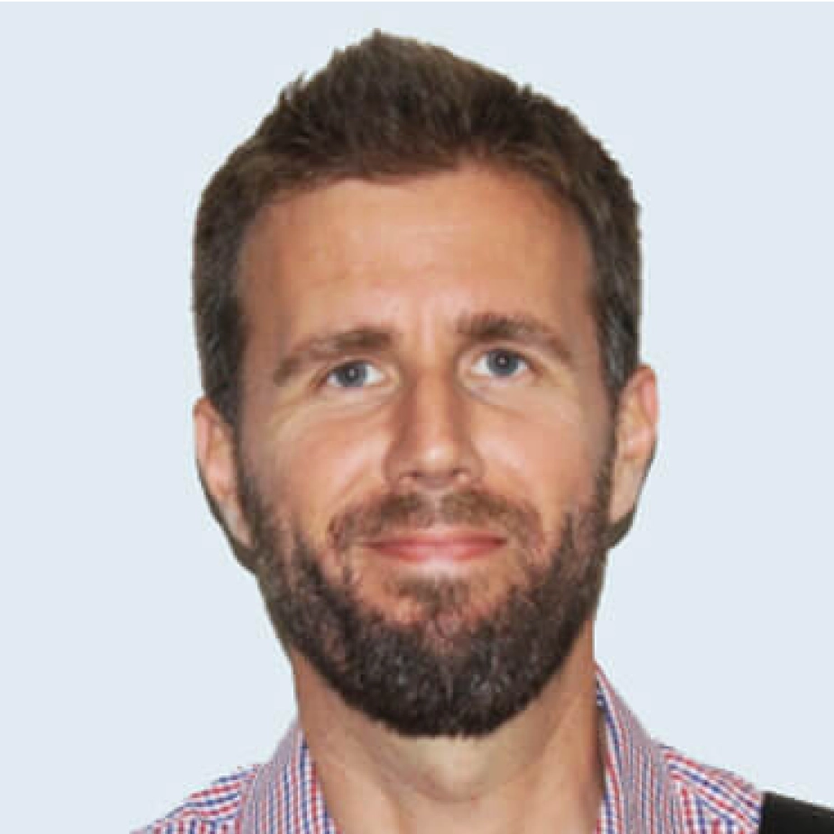 man with a beard smiling