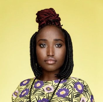 woman in a floral dress posing