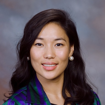 woman wearing earrings smiling